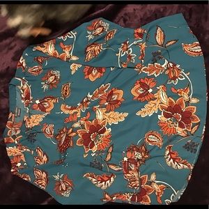 Teal blouse with orange fall pattern